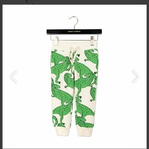 Long sweat pants with t-rex. design.